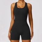 Black ribbed workout romper in Volcanic Ash, ideal as a yoga bodysuit for active wear