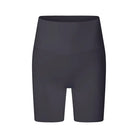 Dark gray high-waisted compression shorts or bike shorts.