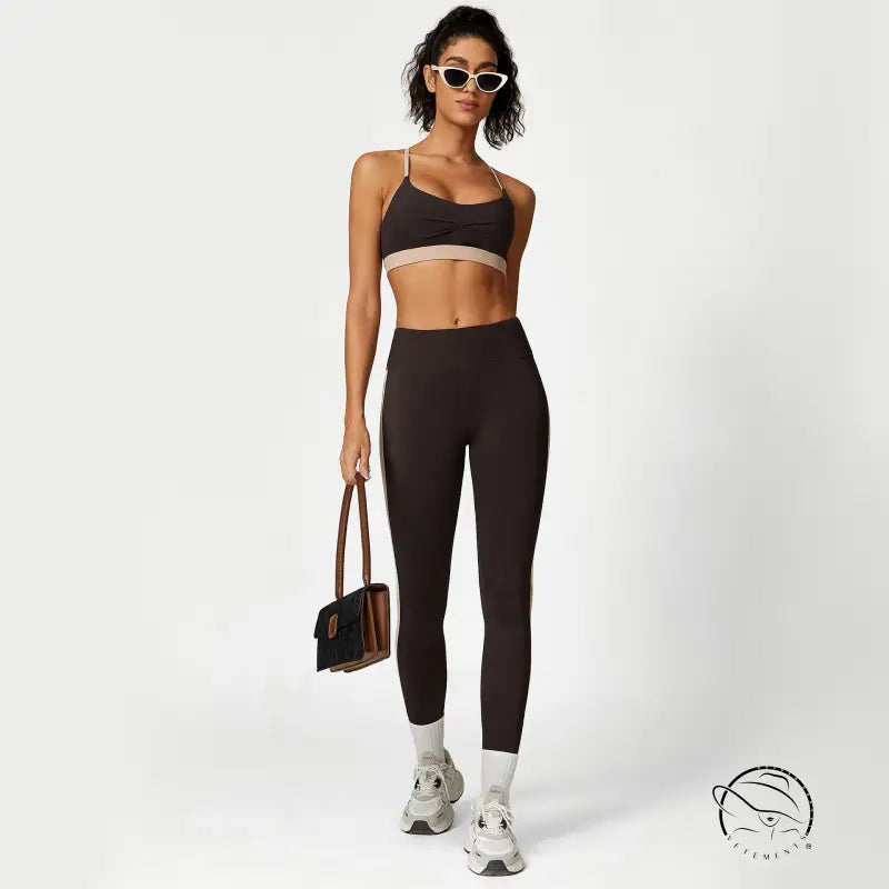Woman in athletic wear for sporty slim nylon color block cutout set with waist hip lift