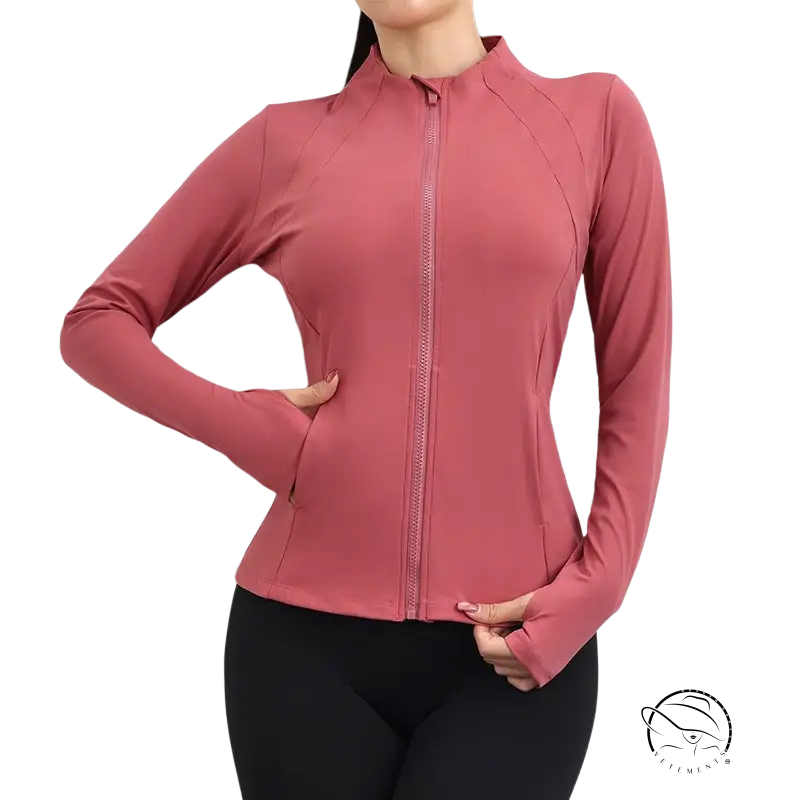 Fitted coral red yoga coat with navy blue accents, long sleeves, zipper, and pockets