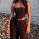 Black Strap Boning Corset Top with Lace-Up Detail paired with stylish cargo pants