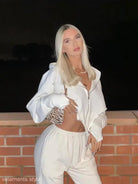 Woman in white sweatsuit from Stylish Casual Sportswear Set for the sexy sweet girl