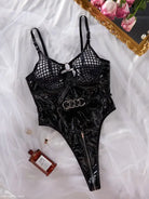 Black patent leather and mesh bodysuit, a stylish sexy leather teddy for modern elegance