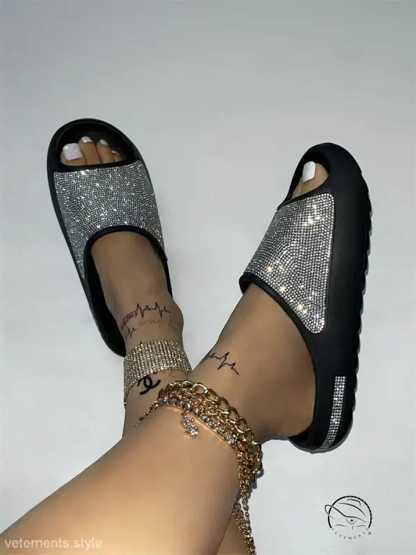 Sparkly silver black stylish slippers on tattooed feet, free shipping