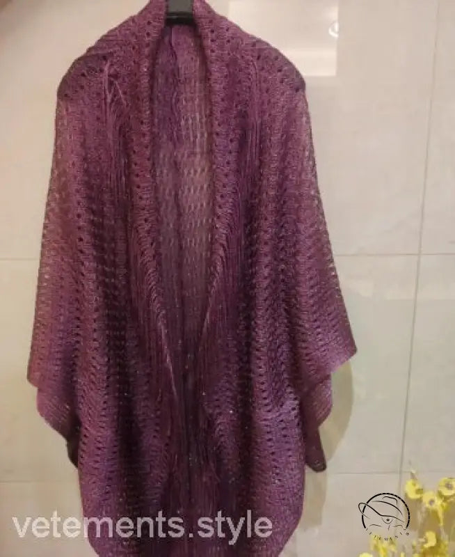 Purple talma shawl beach cover with open-weave pattern and fringe sleeves