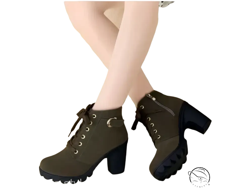 Pair of waterproof high heel martin leather boots for women