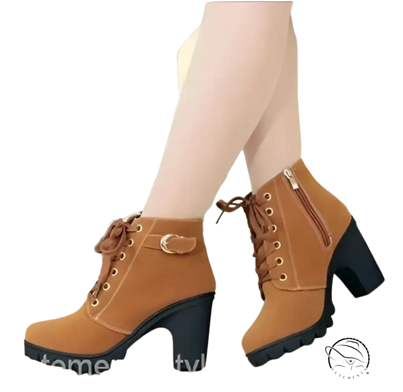 Pair of tan waterproof high heel martin leather boots with chunky heels